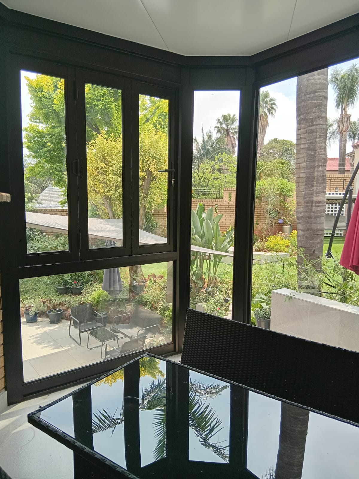 Patio enclosed with aluminium doors and windows
